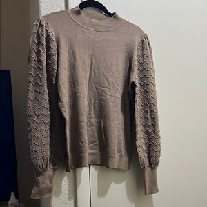 Elegant Brown Turtleneck Sweater with Textured Sleeves